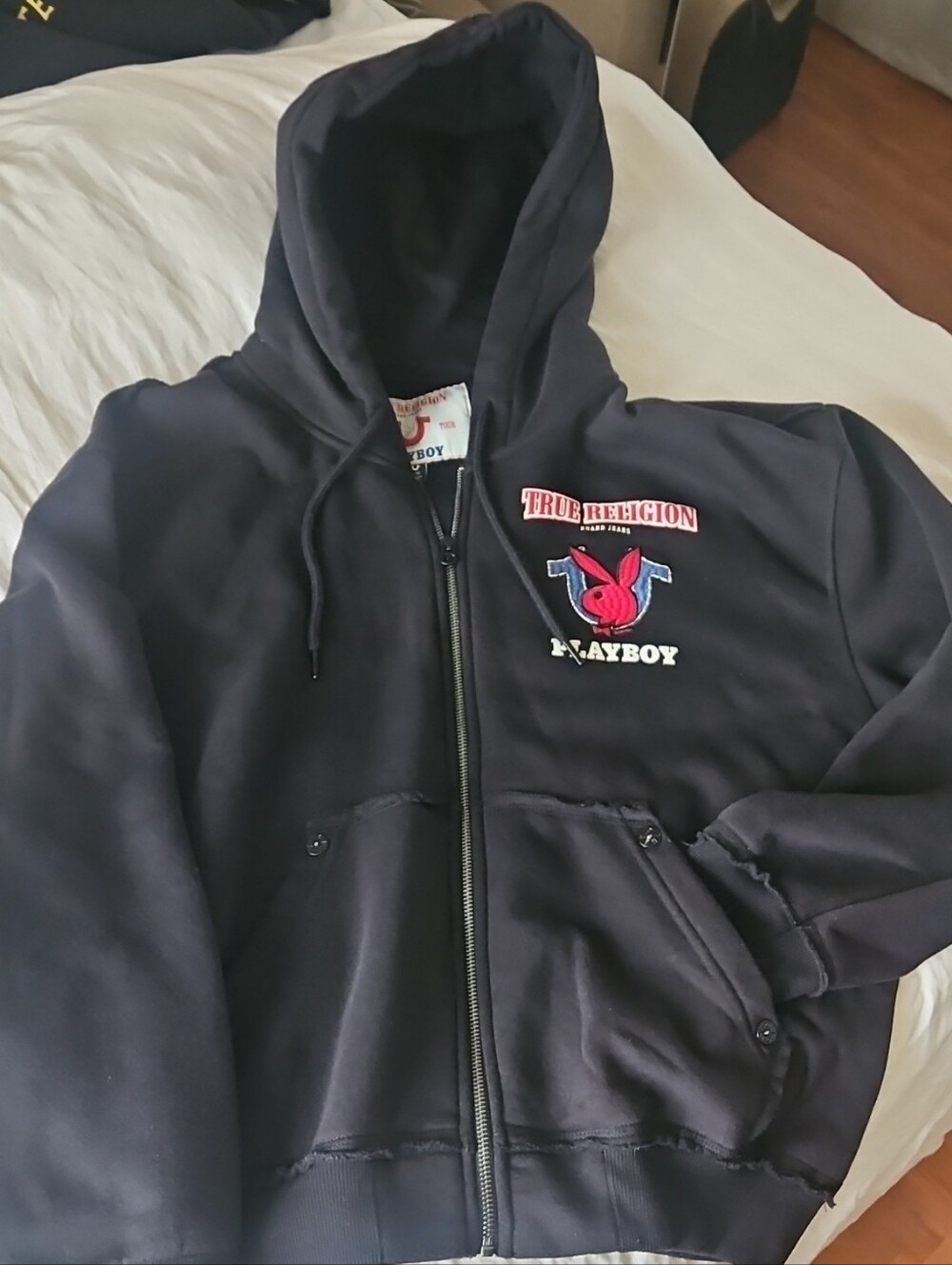 True Religion Black Zip-Up Hoodie with Iconic Blue & Red Bunnie Logo
